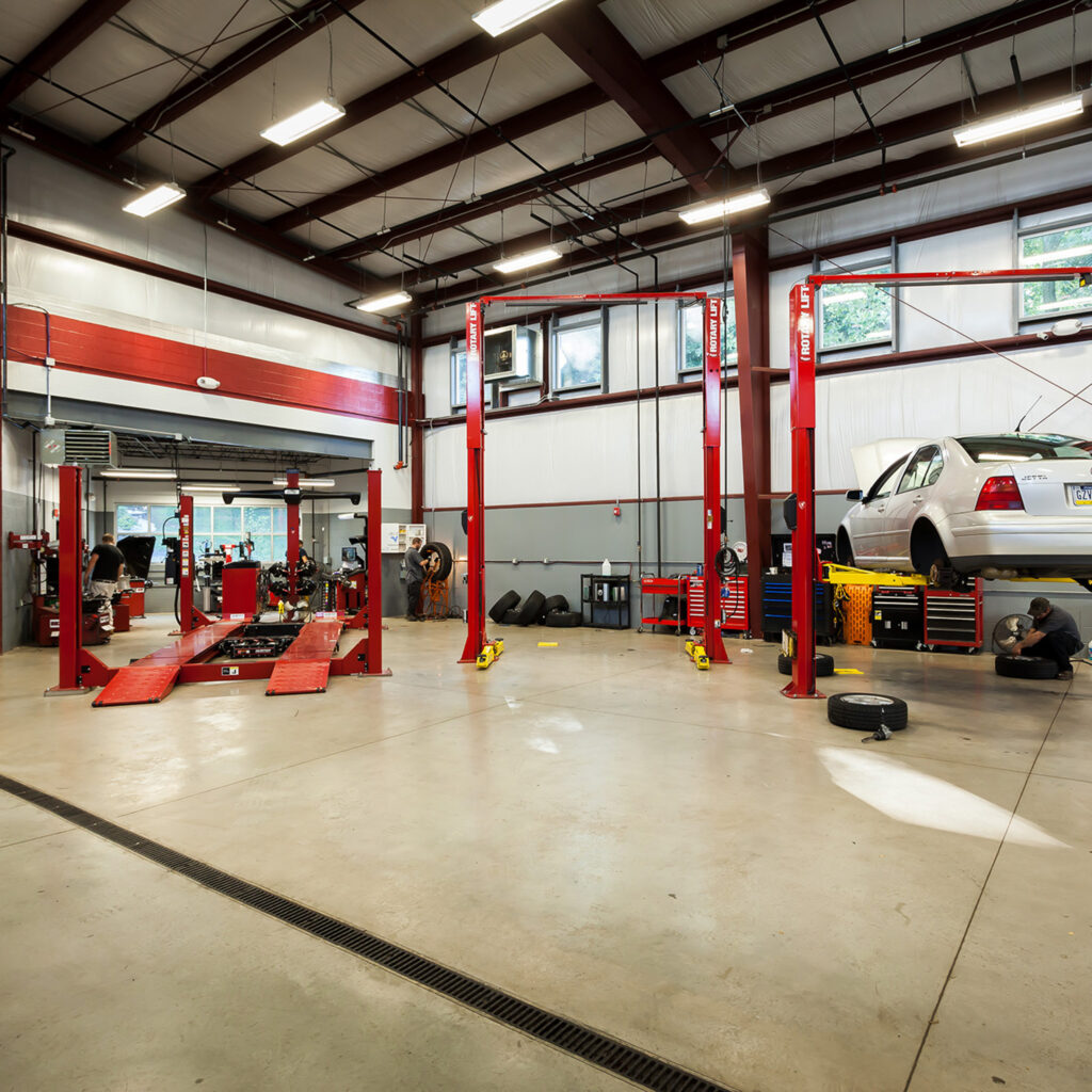 Automotive Service Center with Car on Lift